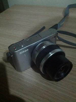 Camara Nikon J1