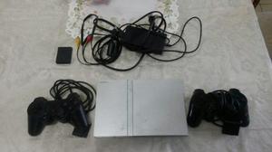 Playstation 2 Con Detalle De Motorcito Q Gira El Cd