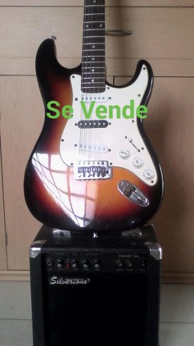 Guitarra Electrica Marca Caliber+amplificador Marca Silverto