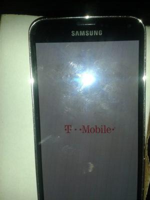 Teléfono Samsung Galaxy S5, Con Forro De Plástico Negro