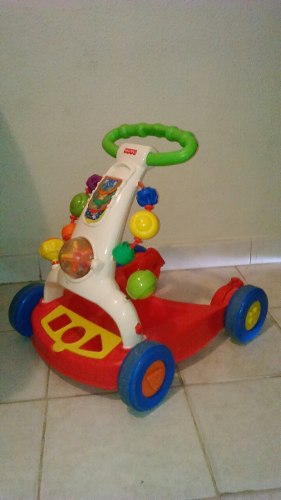 Andadera Fisher Price.