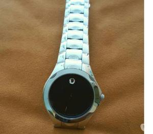 Reloj de pulsera Movado, plateado con esfera azul marino