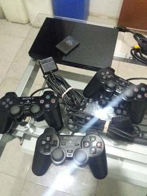 Playstation 2+memoricard 32gb +3 Controles