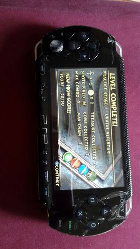 Psp Vita Con Estuche Y Cuatro Juegos