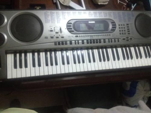 Teclado Casio Kw