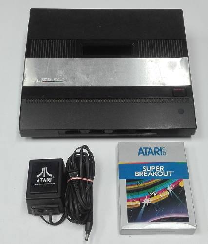 Atari  Consola + Transformador + Juego Sellado Operativo