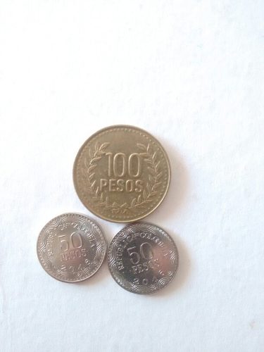 Monedas Colombianas 100 Y 50 Pesos.