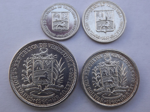 Cuatro Monedas De Plata:  Y 1/4 Bolívares. Año