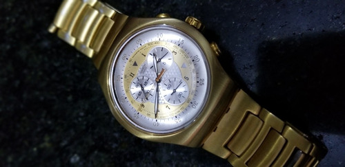 Reloj Swatch Dorado Impecable