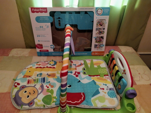 Fisher Price Deluxe Kick N Play Piano Gym.