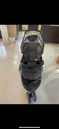 Coche Y Porta Bebé Con Base Incorporada. Baby Trend.