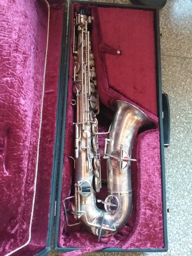 Vendo Saxofón Alto Marca Buescher Americano Color Plata.