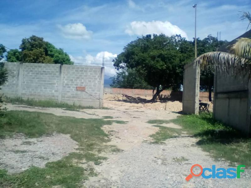 Terreno en Guacara. A un lado de la autopista, en el